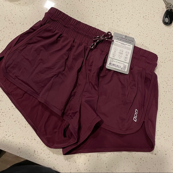 Lorna Jane Pants - NWT Lorna Jane plum running shorts, size S